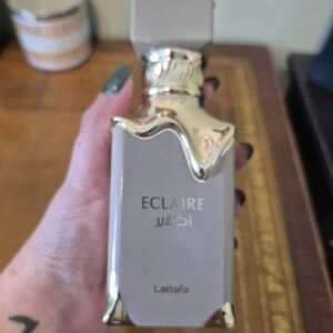 Lattafa Eclaire Perfume with Gold Accents